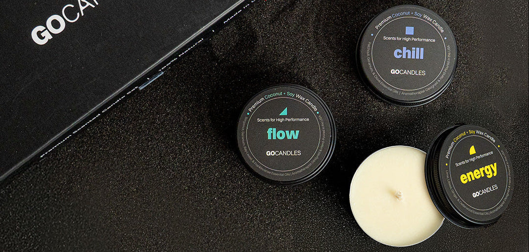 GO CANDLES gift set with candles and a black box on a dark surface